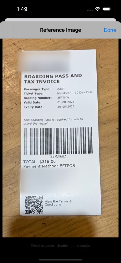 Reference image viewer on iPhone showing the original photographed ferry ticket