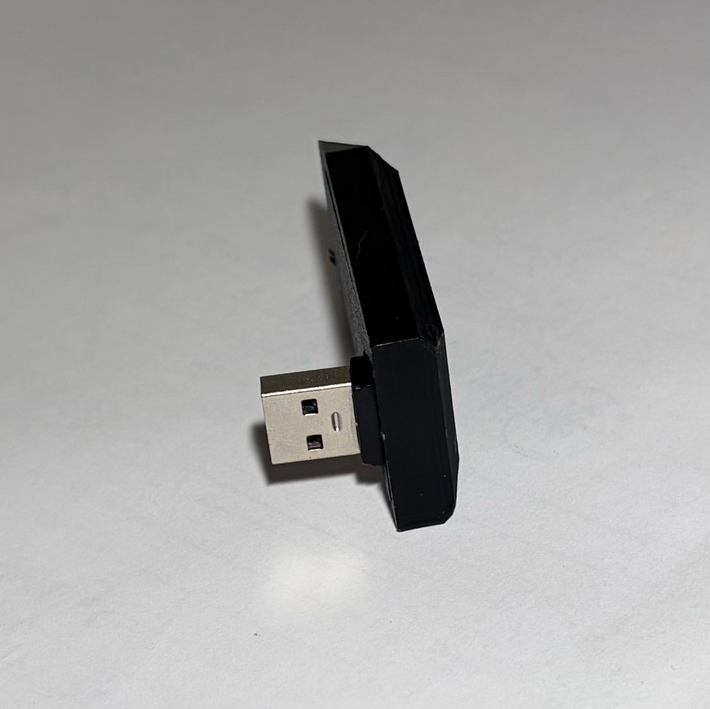 Side profile of the Flux Drive showing its slim case and USB-A plug