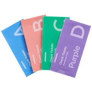 Four J.Burrows Check Tickets books fanned: blue A, red B, green C, purple D